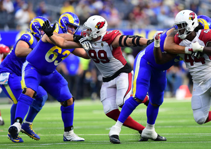 Oct 3, 2021; Inglewood, California, USA; Arizona Cardinals defensive end J.J. Watt (99) works against Los Angeles Rams offensive guard Austin Corbett (63) during the second half at SoFi Stadium. Mandatory Credit: Gary A. Vasquez-USA TODAY Sports
